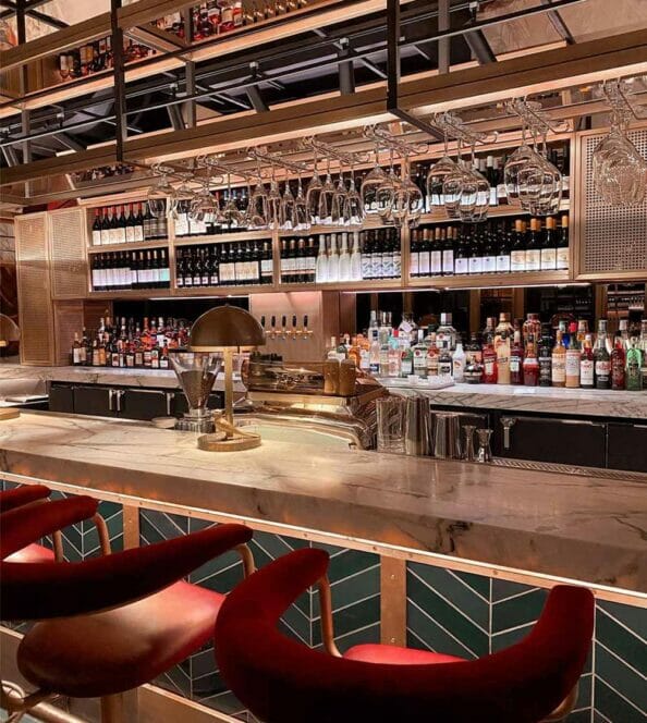 bar at Greystone's with velvet red bar chairs