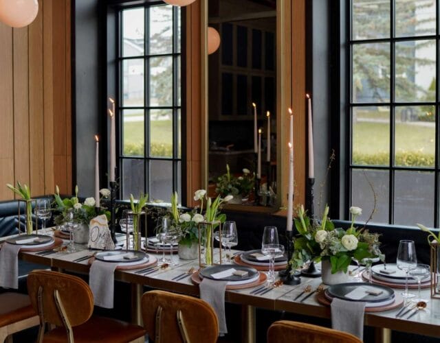 Elegant private dining table with candles and floral decor